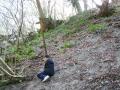 Jamie climbing up the steep and slippery footpath.