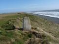 Walked along beach then over fence.