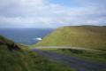 Bend in road by cliffs